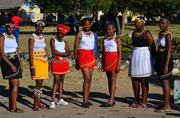 Usher students in traditional dress at a cultural event